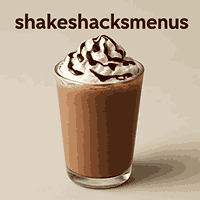 A tall glass of creamy chocolate shake topped with whipped cream and drizzled with chocolate syrup, featuring the text “shakeshacksmenus” above it.