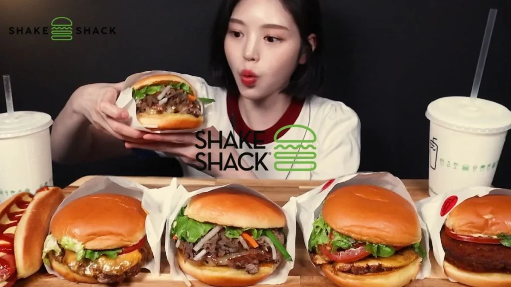 I Tried Shake Shack’s Korean-Style Menu & This Item Steals The Show The Korean-Style Menu is back at Shake Shack as a young woman reacts to multiple burgers with juicy beef patties and fresh toppings.