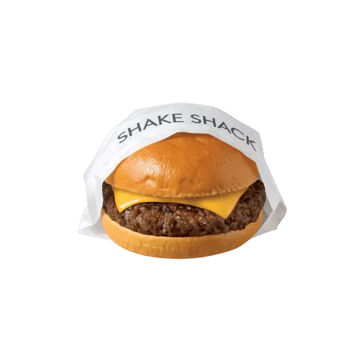 Shake Shack cheeseburger partially unwrapped in branded white paper showing beef patty and melted cheese - authentic to-go burger packaging
